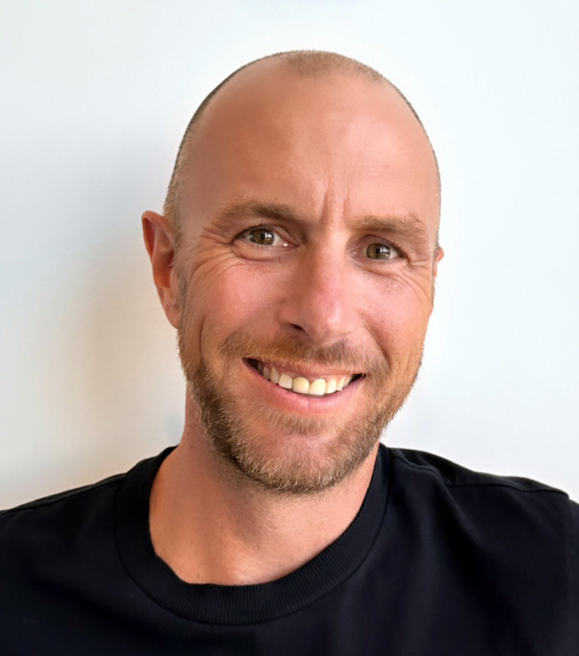 Steve Murray, co-founder of Coralliance, wearing a black t-shirt in a casual setting.